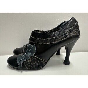 Anthropologie Bobbi Blu  women size 7.5M  black leather Laced heeled booties bow